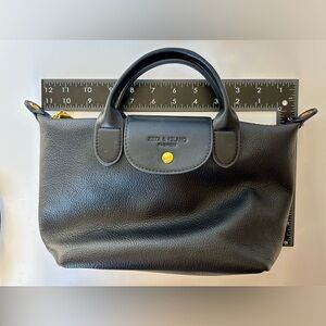 Black Leather Handbag with Gold Accents